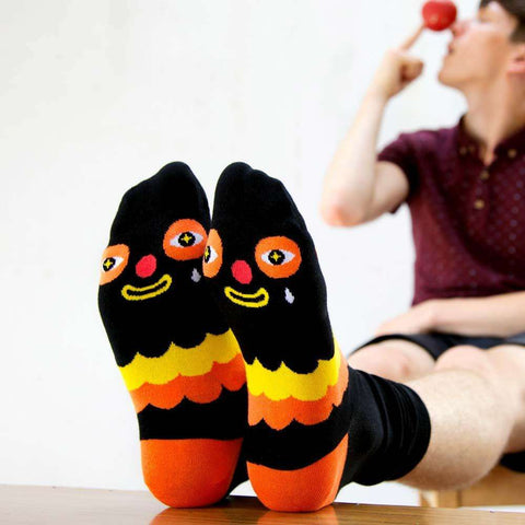 Novelty socks with illustrated character called Kloss