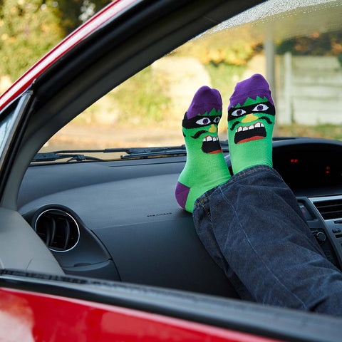 Funky socks with a green & purple character design